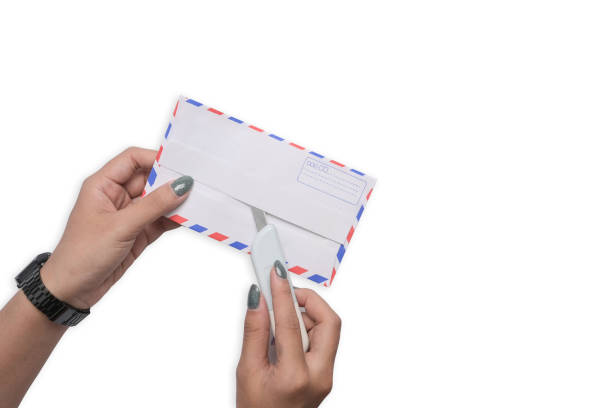 istock Young woman opening envelope on white background. Copy space for text. 1395291821