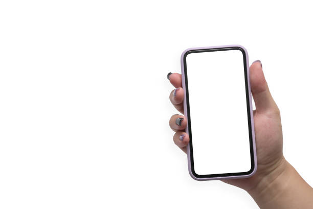istock Mock up image of woman hand holding mobile phone isolated on white background. Empty screen for graphics display montage. 1395292034