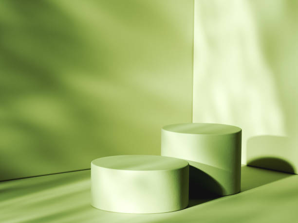istock Green colour theme with two cylindrical pedestals in shaded room. 3d computer graphic template of displaying place for your products. 1395294244