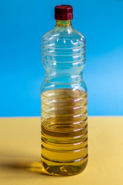 istock Plastic sunflower oil can with red cap 1395294489