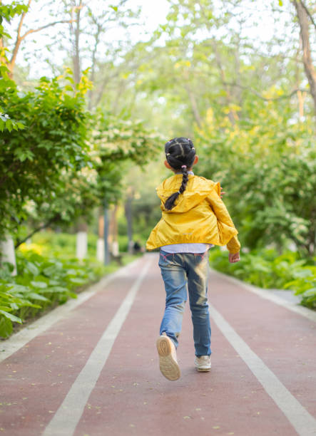 istock Asian Little Girl Running 1395299953