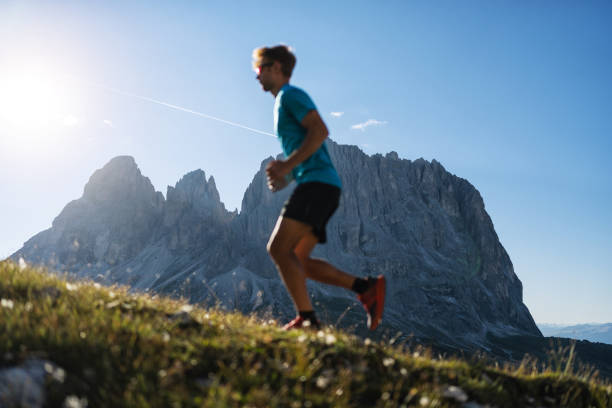 istock Man trail running on mountain: the Dolomites 1395300638