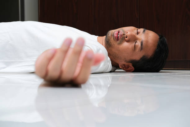 Adult Asian man fainted in the floor Adult Asian man fainted in the floor fainted stock pictures, royalty-free photos & images