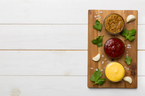 istock Many different sauces and herbs on table, flat lay top view. sauces on plate, healthy concept 1395303848