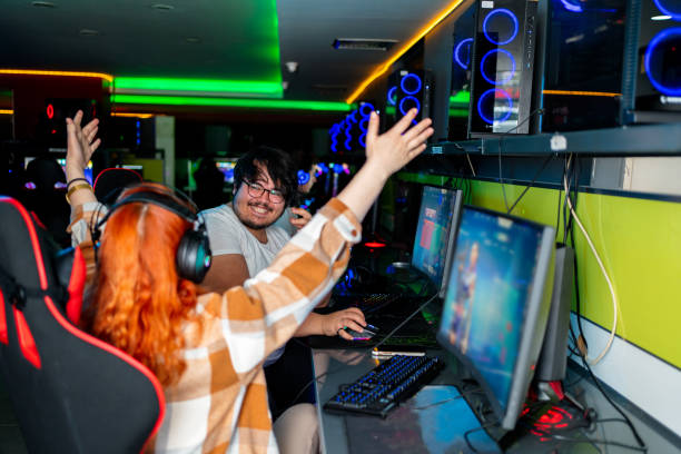 istock Young couple playing video games 1395304087