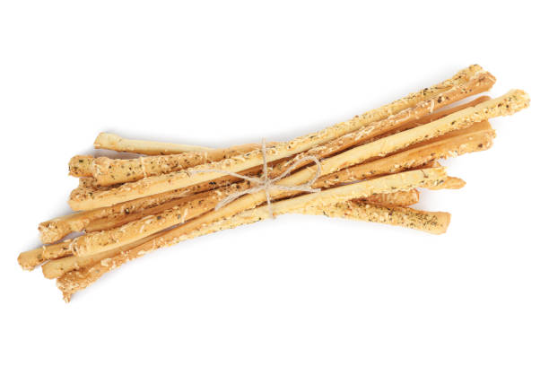istock Fresh delicious grissini sticks on white background, top view 1395305056