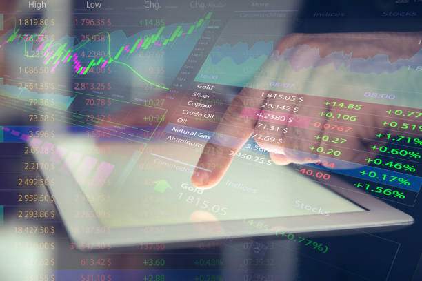 istock Stock exchange. Man using tablet and illustration of rating graph 1395305865