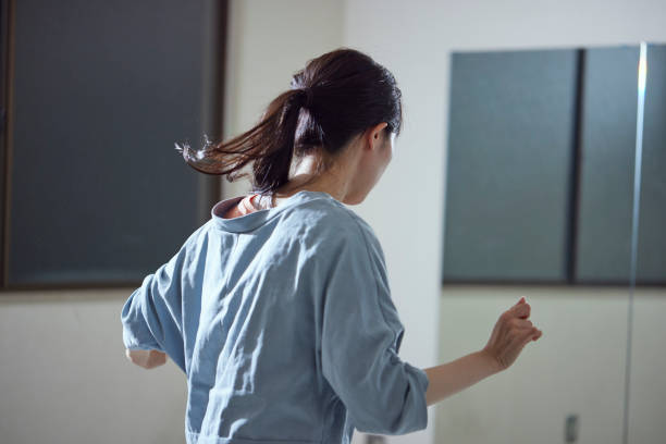 istock Young Japanese woman practicing dance 1395306221