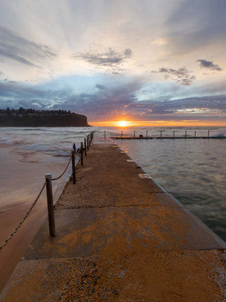 istock Bilgola rock pool sunrise 1395308478