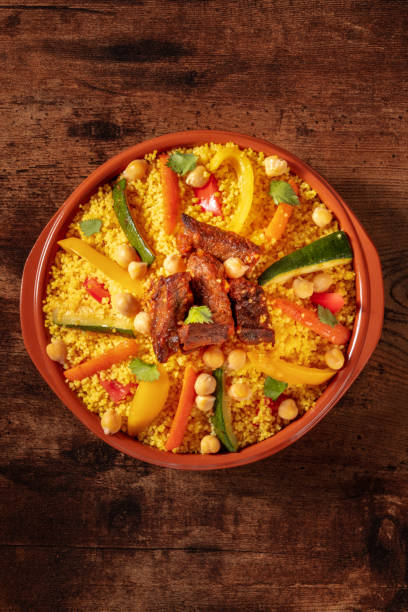 istock Couscous with meat and vegetables, festive Moroccan dinner, overhead 1395310041