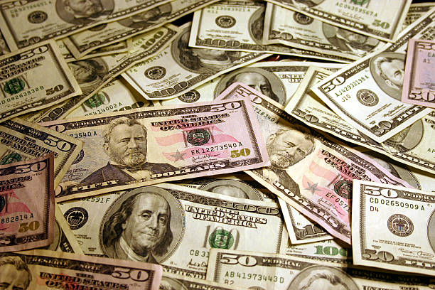 istock background of 50s and hundreds 139531201