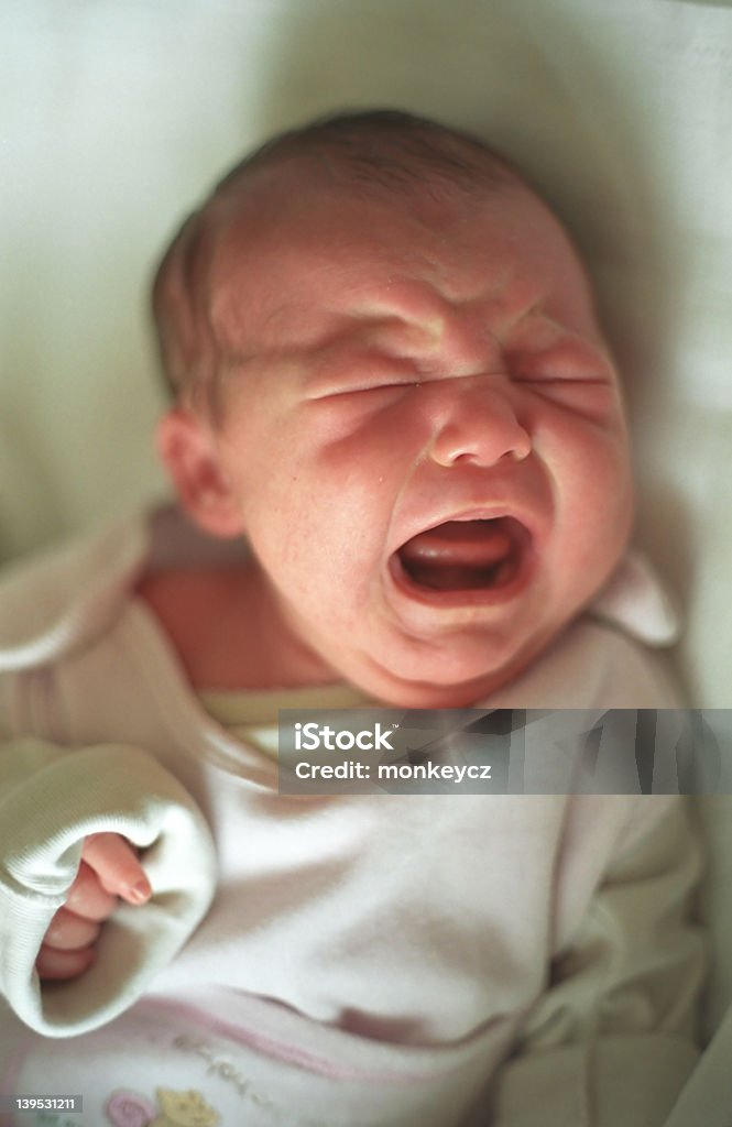 Newborn child crying Newborn child crying. Soft light. American Culture Stock Photo