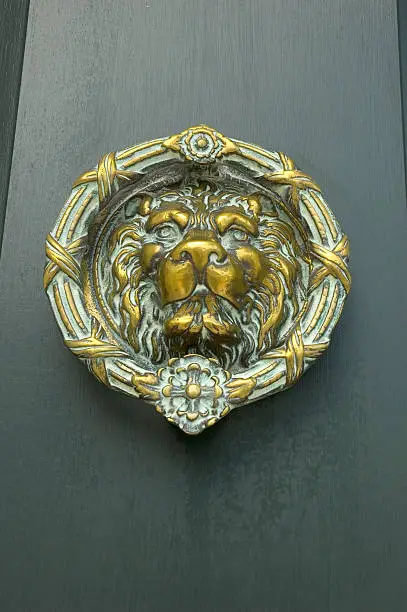 Antique lionshead doorknocker in Charleston, SC