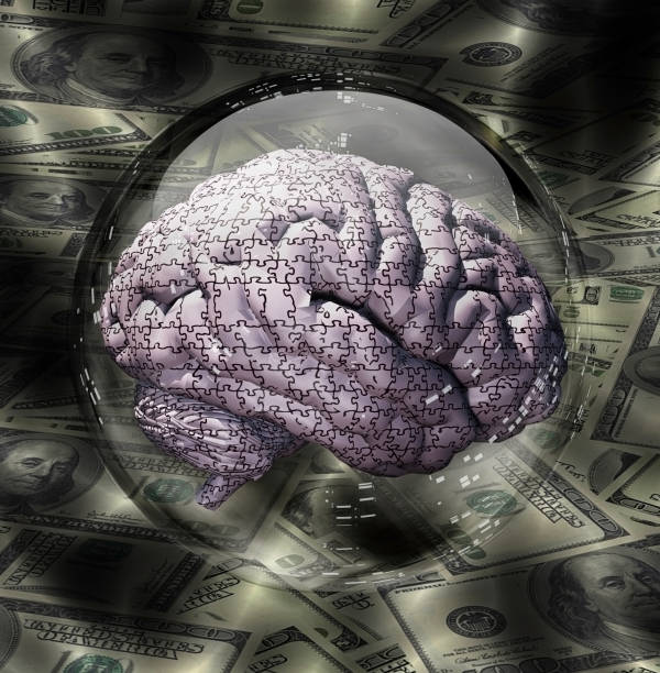 istock Puzzle Brain and US Currency 1395315951