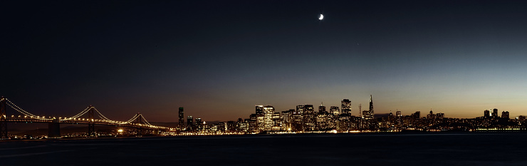 the skyline of San Francisco with bay bridge at night