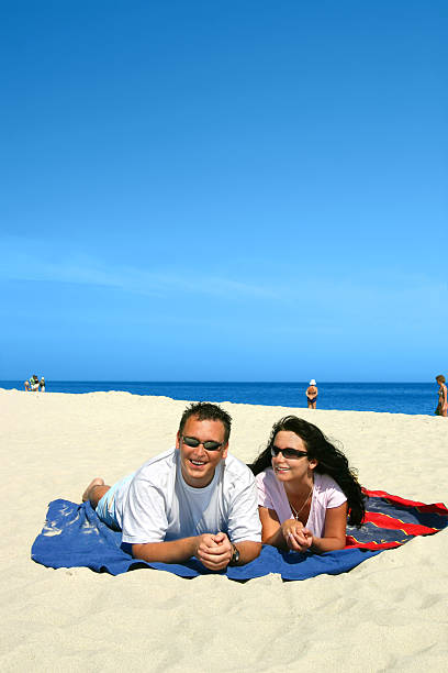 istock Happy Couple On The Beach 139531752