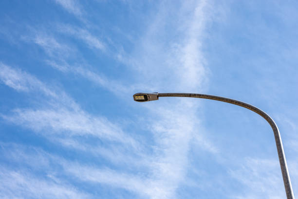 istock Blue sky and street lights 1395318209