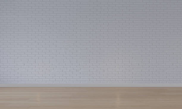 istock Brick wall interior background with wood floor. 1395318761