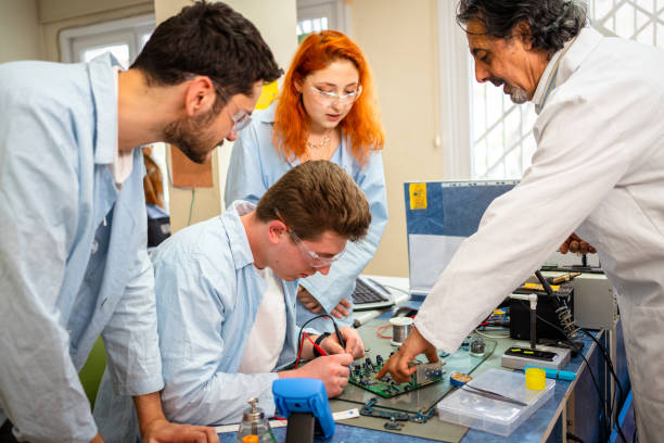 istock Group of young people in technical vocational training with teacher 1395320718
