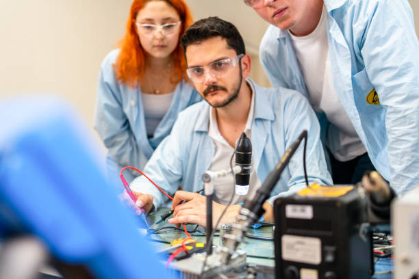 istock Group of young people in technical vocational training with teacher 1395320990