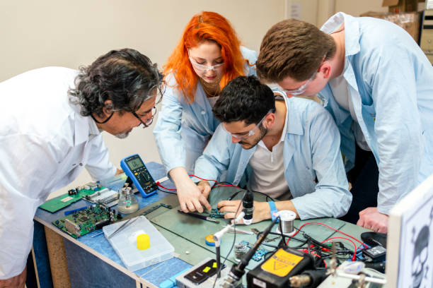 istock Group of young people in technical vocational training with teacher 1395320991