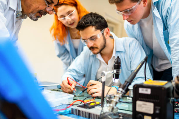 istock Group of young people in technical vocational training with teacher 1395321089