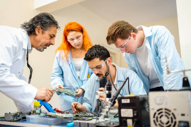 istock Group of young people in technical vocational training with teacher 1395321444