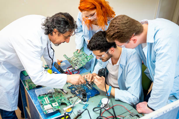 istock Group of young people in technical vocational training with teacher 1395322080