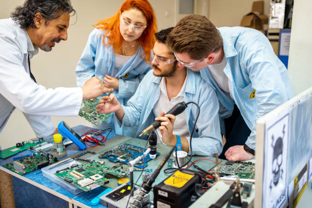 istock Group of young people in technical vocational training with teacher 1395322081