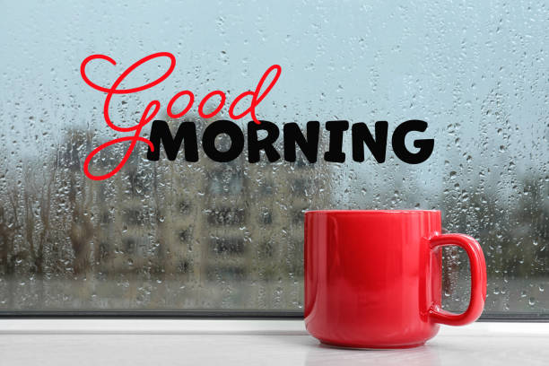 istock Cup of hot drink on windowsill. Good morning 1395322242