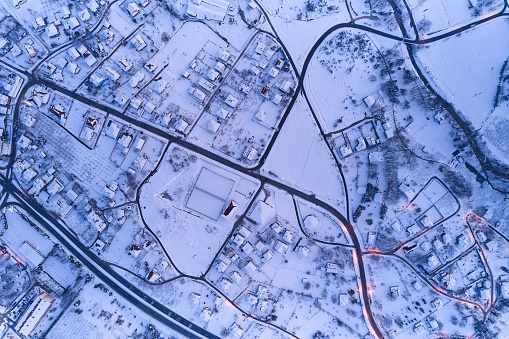 Aerial view of snowed in traditional housing suburbs in Turkey