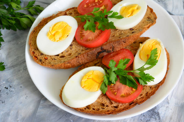 istock healthy sandwiches with boiled eggs and tomatoes, close-up 1395325048