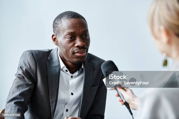Executive Interview Stock Executive Giving Interview Stock Photo - Download Image Now - Interview ...