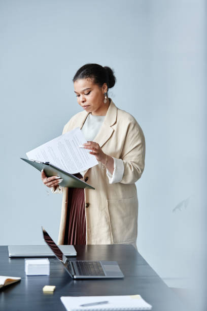 istock Female Business Manager Minimal 1395329918