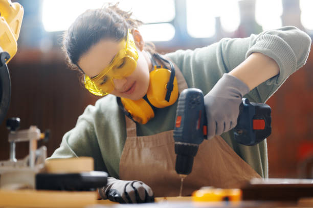 istock woman carpenter in workshop 1395330981
