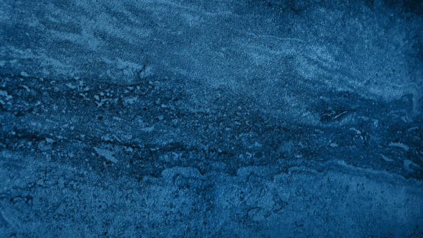istock blue breccia travertine marble background with blank space for design. abstract background use for wallpaper. light blue marble,quartz texture backdrop (focused at center o image). 1395331101