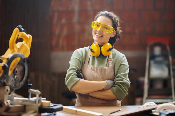 istock woman carpenter in workshop 1395331194