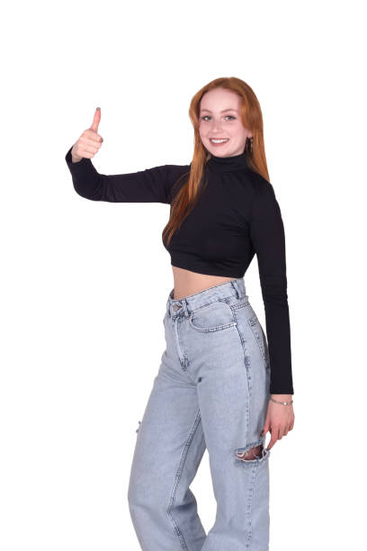 istock young woman with a thumbs up gesture isolated on white background 1395331307