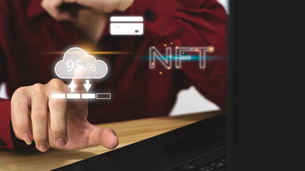 istock NFT irreplaceable token financial transaction concept. Businessman touches NFT holograms. Unique art on digital binary background. 1395331398