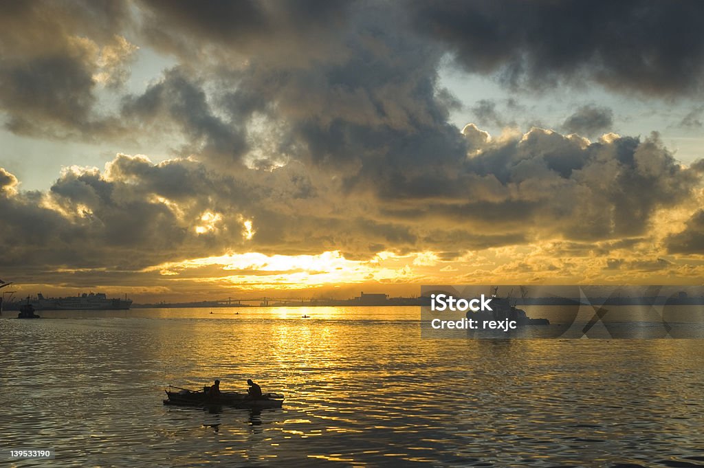 Mactan Channel Sunrise over Mactan Channel.  Taken with a Nikon D70, onboard the Supercat on my way to Ormoc, Leyte. Cebu Province Stock Photo