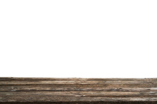istock Empty wooden table top isolated on white background 1395333102