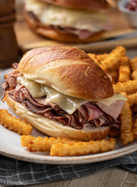 istock Hot ham and cheese submarine sandwich 1395336401