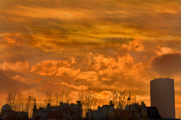 The sun setting over Paris