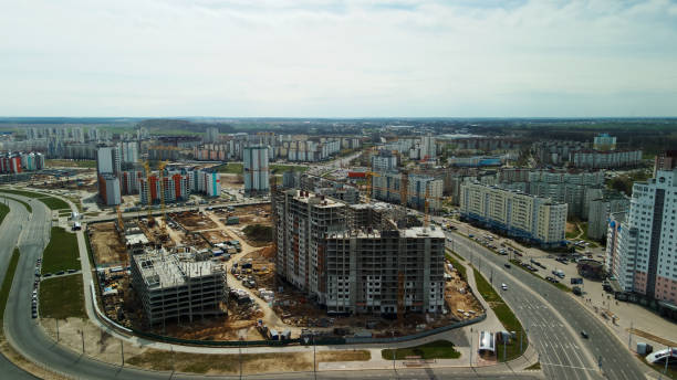 istock Large construction site. Construction of modern multi-storey residential buildings. Construction of apartment buildings from concrete and glass. Aerial photography. 1395338864