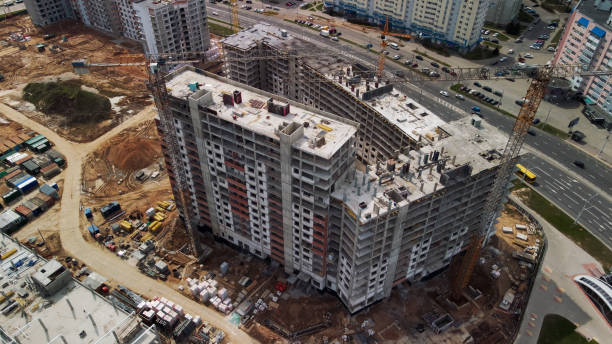 istock Large construction site. Construction of modern multi-storey residential buildings. Construction of apartment buildings from concrete and glass. Aerial photography. 1395338988
