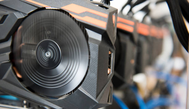 istock Bitcoin mining farm. IT hardware. Electronic devices with fans. Cryptocurrency miners 1395341953