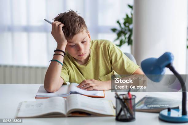 Ugh Im So Bored With This Homework Stock Photo - Download Image Now - Textbook, Boys, Child