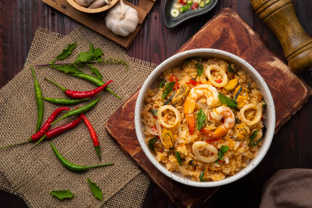 istock Fried rice with shrimp ,green Mussels and squid 1395345411
