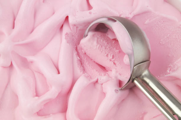istock Chocolate ice cream with scoop 1395346326
