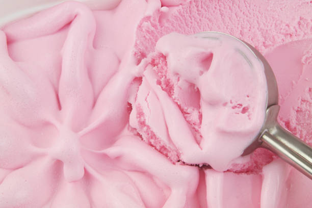 istock Strawberry ice cream with scoop 1395346363
